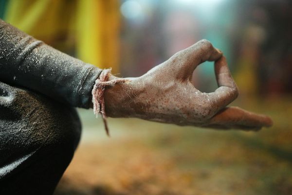Close up of hands in mudra during yoga session outdoor